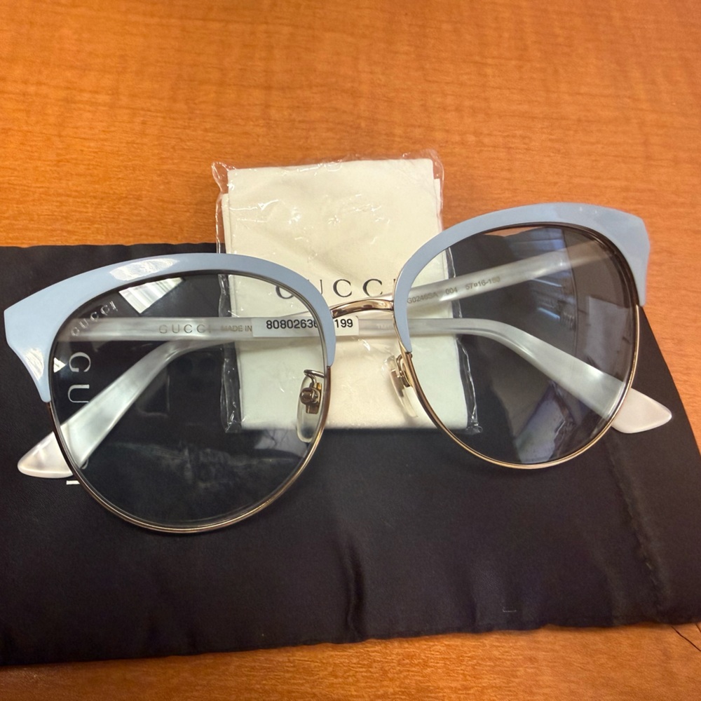 Gucci Cat Eye Sunglasses in light blue and Gold